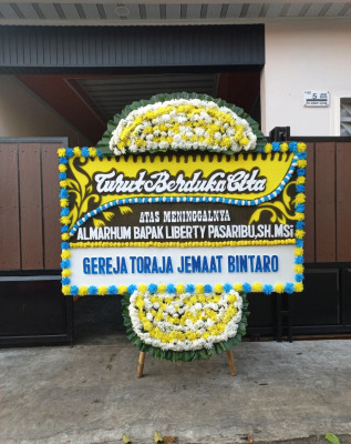 Papan Bunga Duka di Purbayan